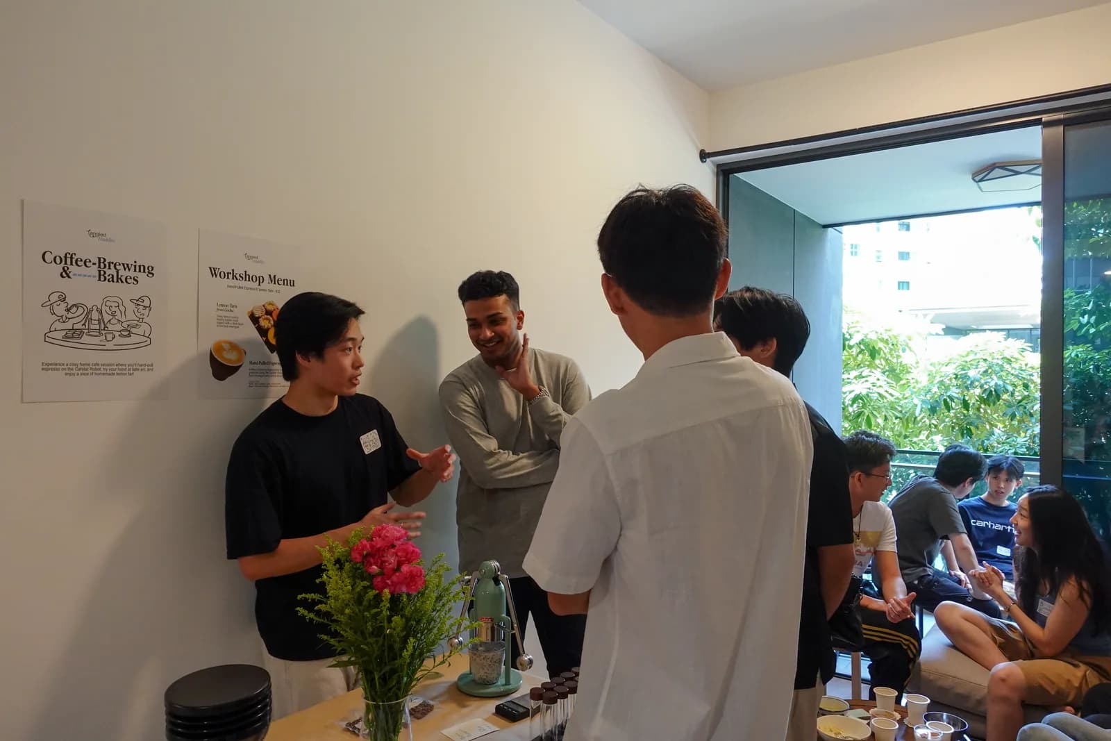 People chatting at a Tangled coffee and baking gathering