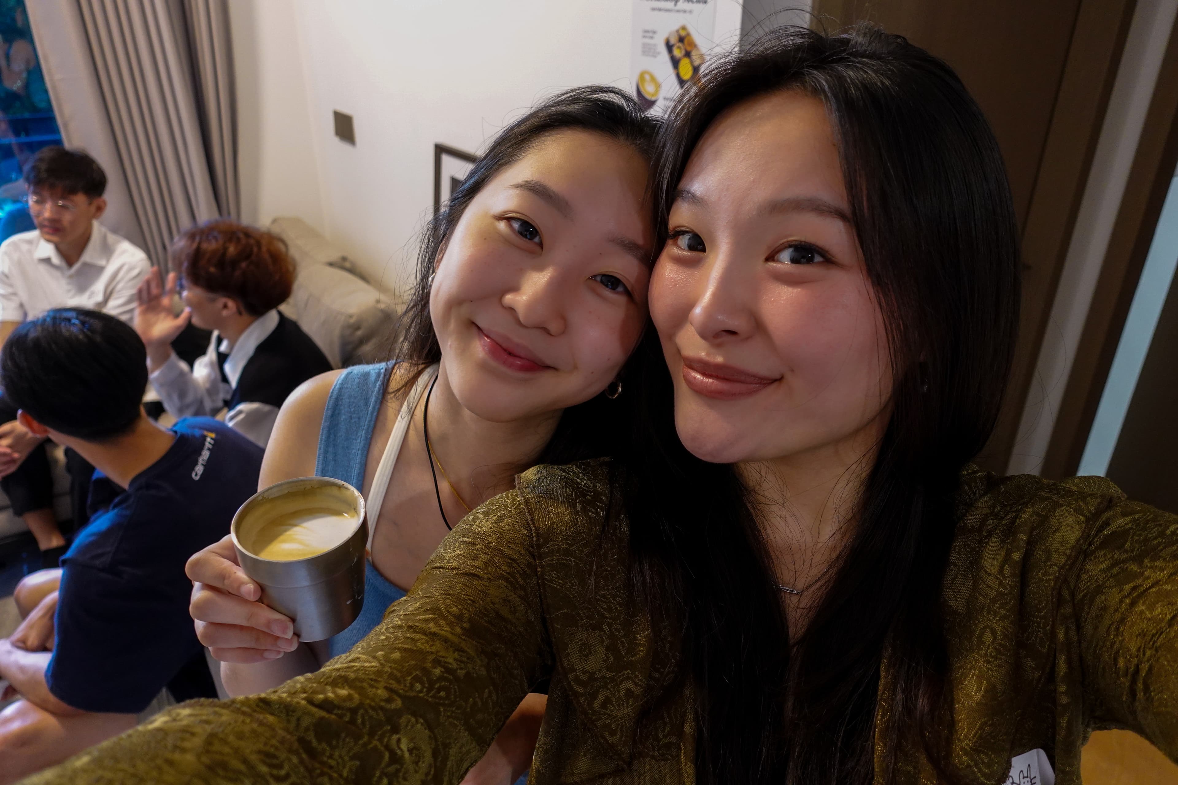 Two friends taking a selfie after meeting on Tangled.